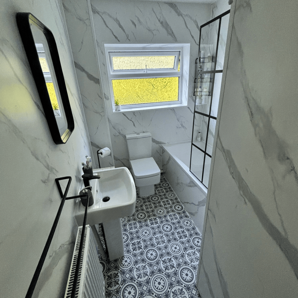Transform Your Bathroom with the Timeless Elegance of Carrara Marble Shower Panels