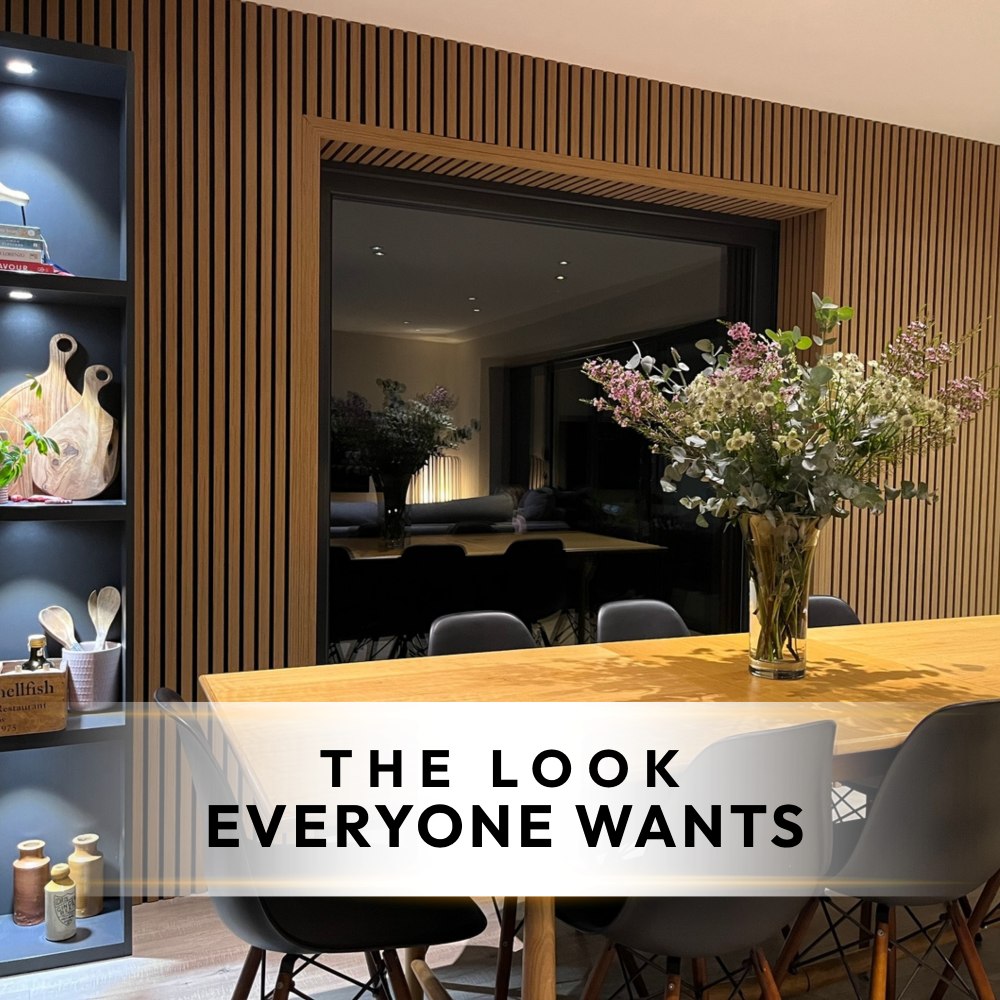 Warm Wood, Black Details, Soft Lighting: The Interior Formula Making Acoustic Panels So Popular